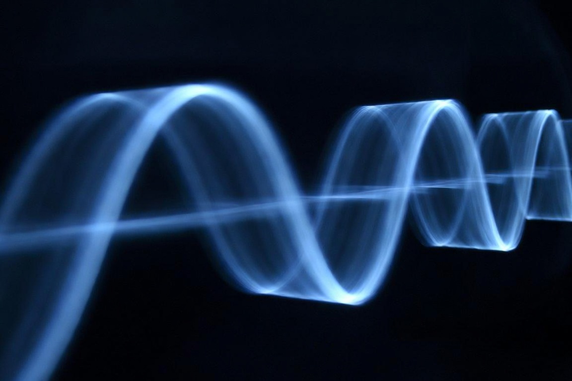 Abstract quantum network, glowing blue energy nodes on dark background, futuristic minimal, no text
